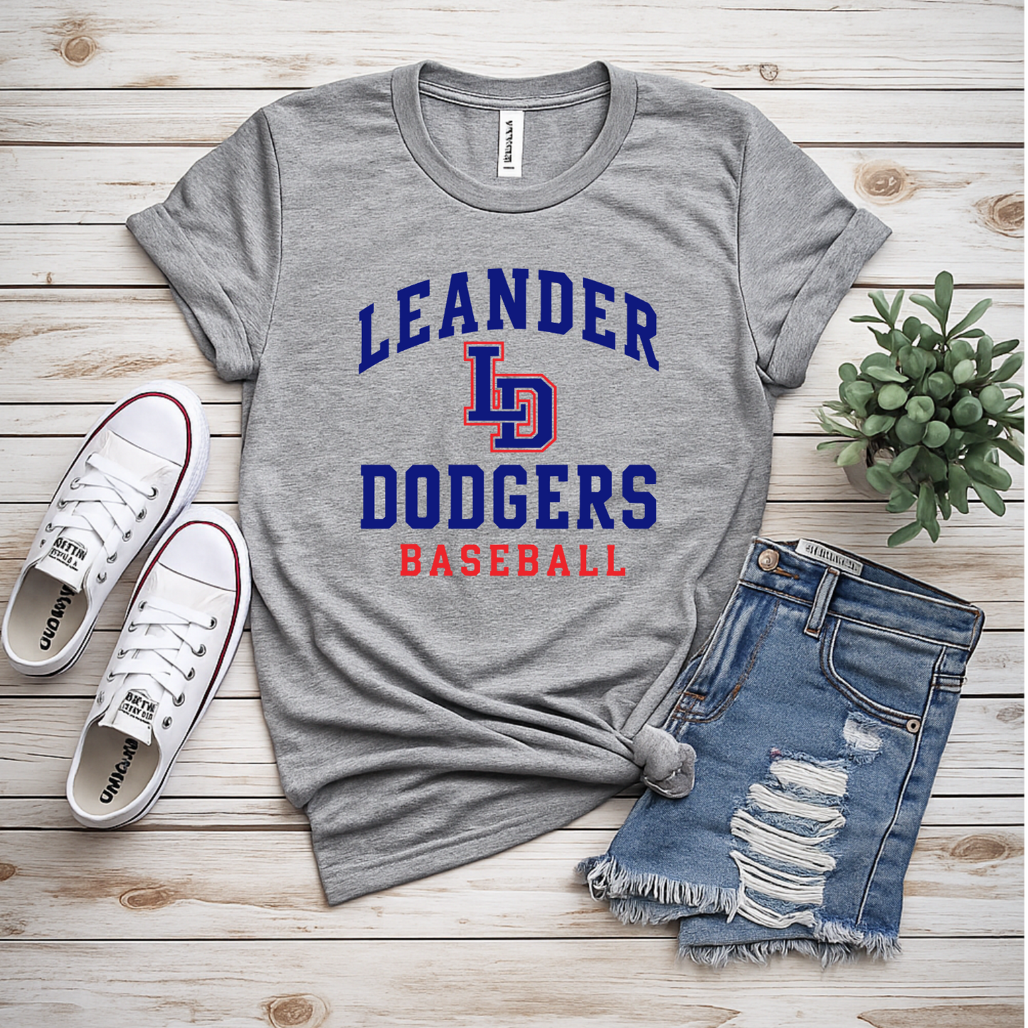 Gray Leander Dodgers Baseball spirit wear T-shirt with royal blue varsity lettering and red LD team logo