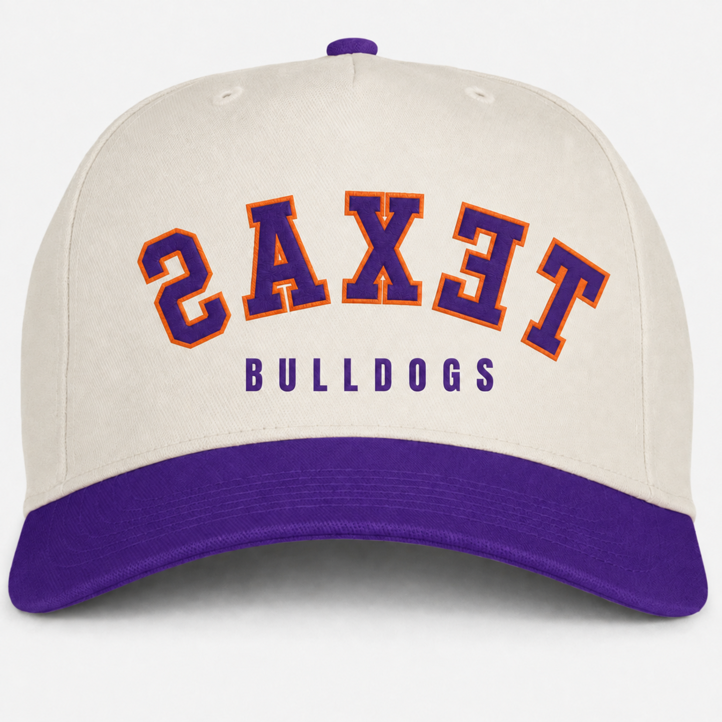 Cream Texas Bulldogs baseball hat with purple bill and purple and orange lettering