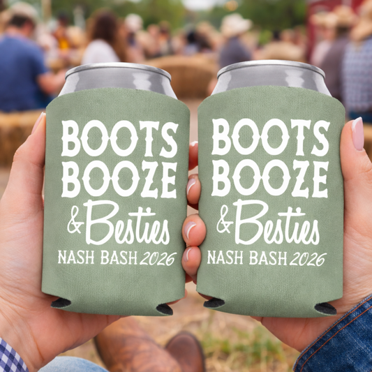 Two green can coolers with 'Boots, Booze & Besties' text held by a person wearing cowboy boots at an outdoor event.