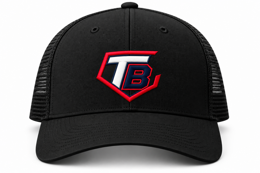 A black trucker hat with a structured front panel and black mesh back, featuring a red, white, and blue embroidered shield logo with the letters 'TB' on the front.