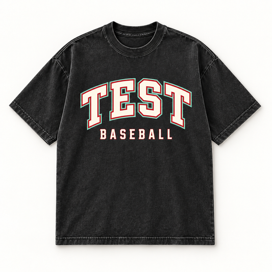 A washed black short-sleeve t-shirt with 'TEST BASEBALL' printed on the chest in red and white varsity-style lettering, shown flat against a white background.