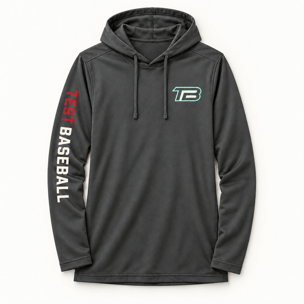 A dark gray hooded long-sleeve performance shirt with 'TEST BASEBALL' printed vertically on the right sleeve in white and red, and a teal and white 'TB' logo on the left chest, shown against a plain white background.