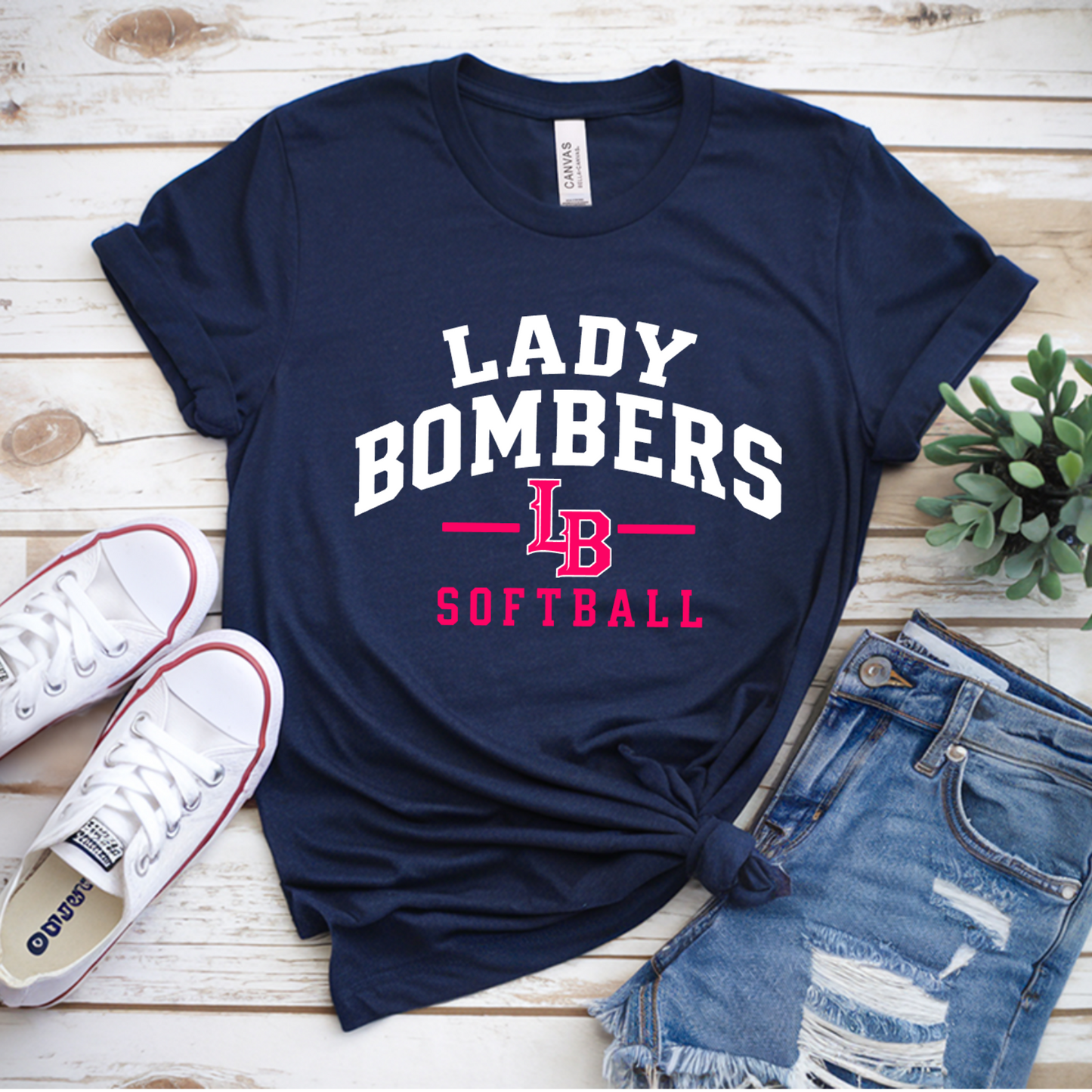 Navy Lady Bombers Softball tee with white varsity lettering and pink LB logo