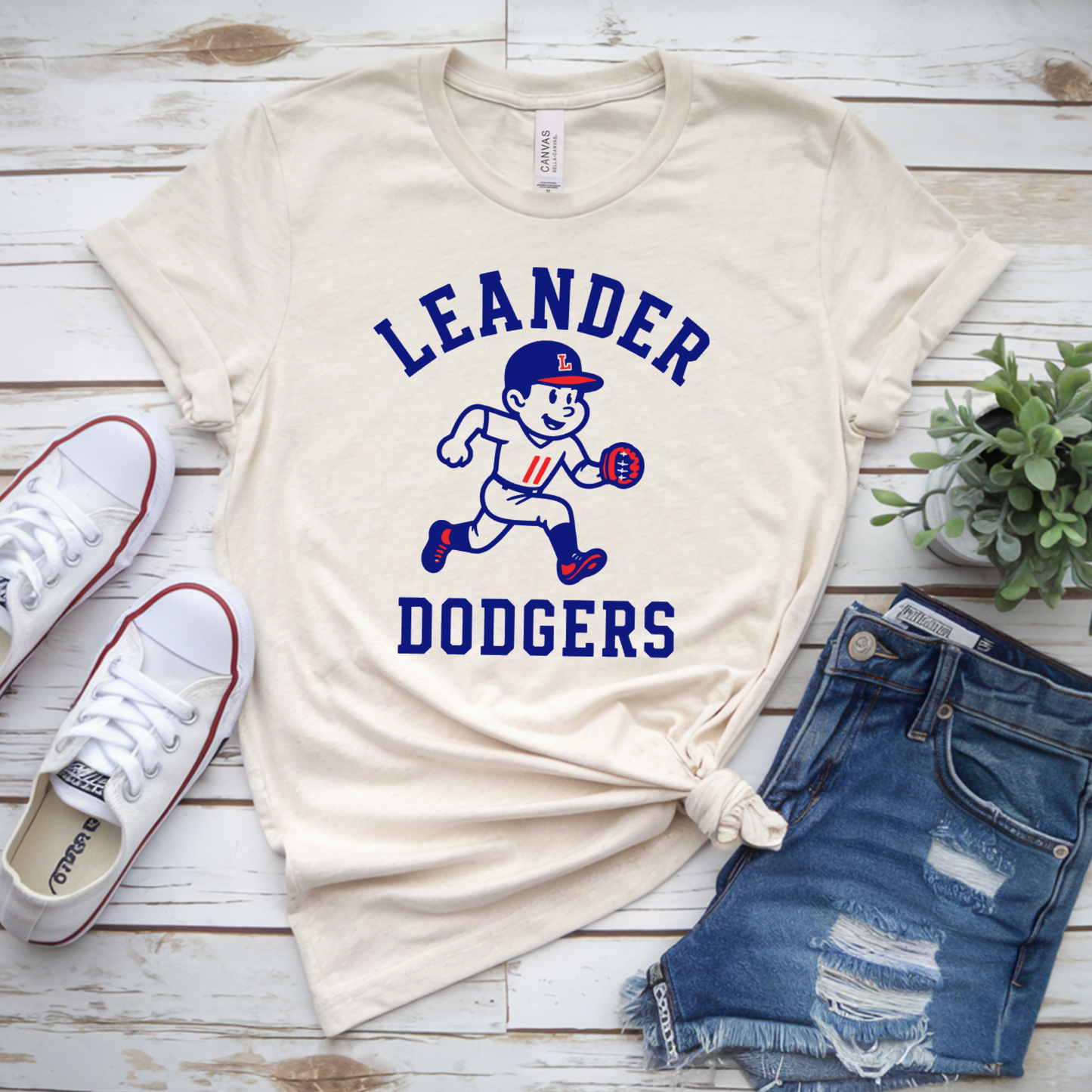 Cream Leander Dodgers retro baseball T-shirt with vintage baseball player graphic in royal blue and red