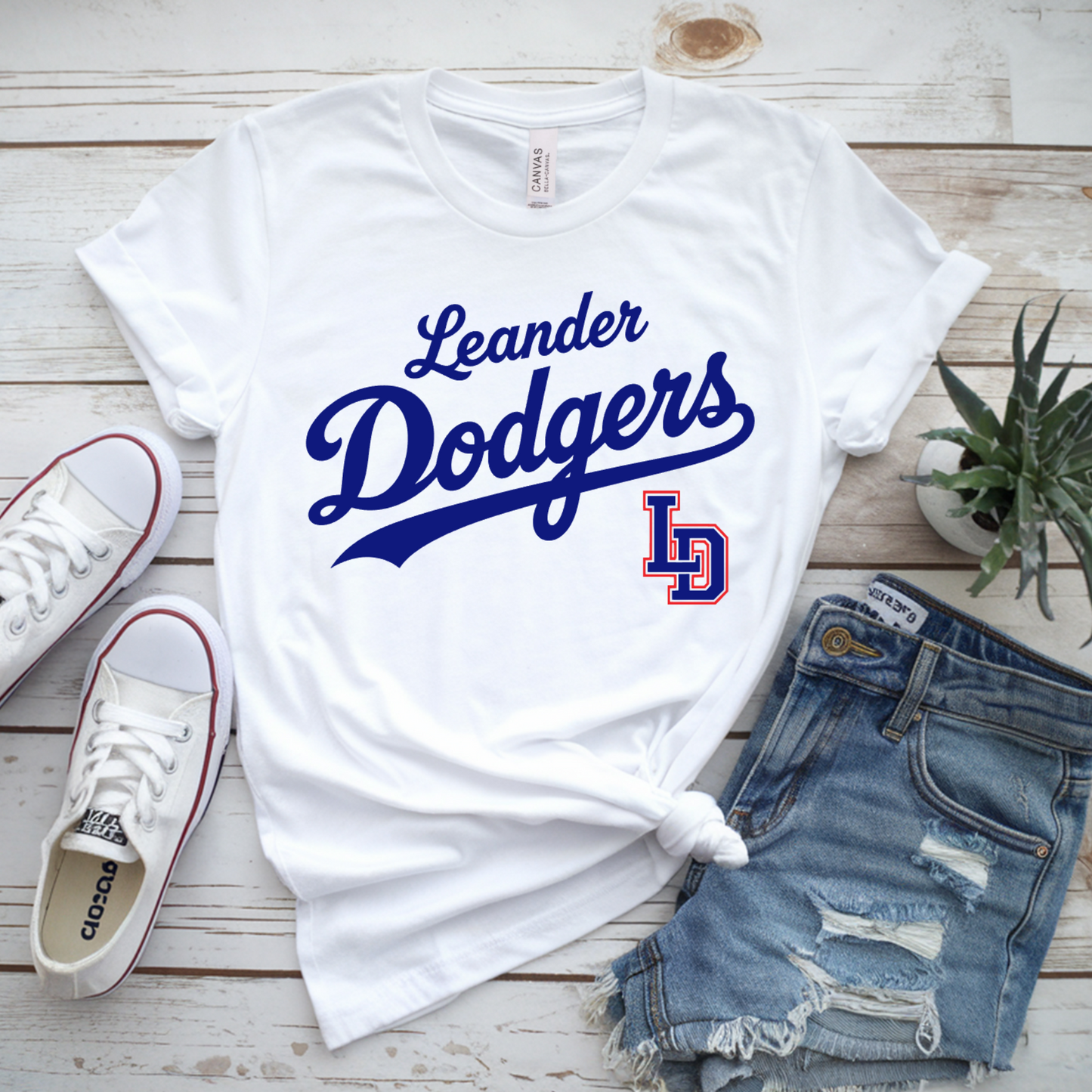 White Leander Dodgers baseball spirit wear T-shirt with royal blue script and red and blue LD logo