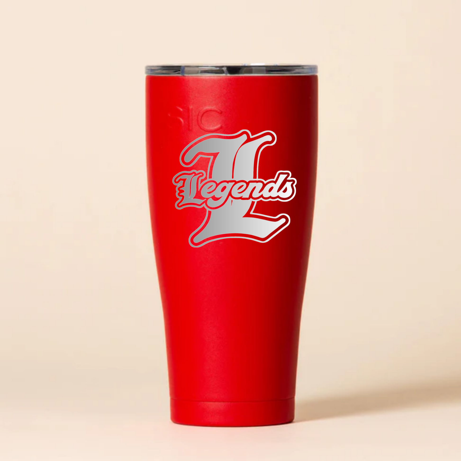 Red tumbler with 'Legends' logo on a beige background