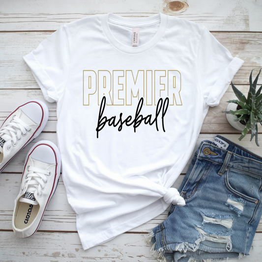 White t-shirt with 'Premier Baseball' text, Converse shoes, denim shorts, and a plant on a wooden surface.