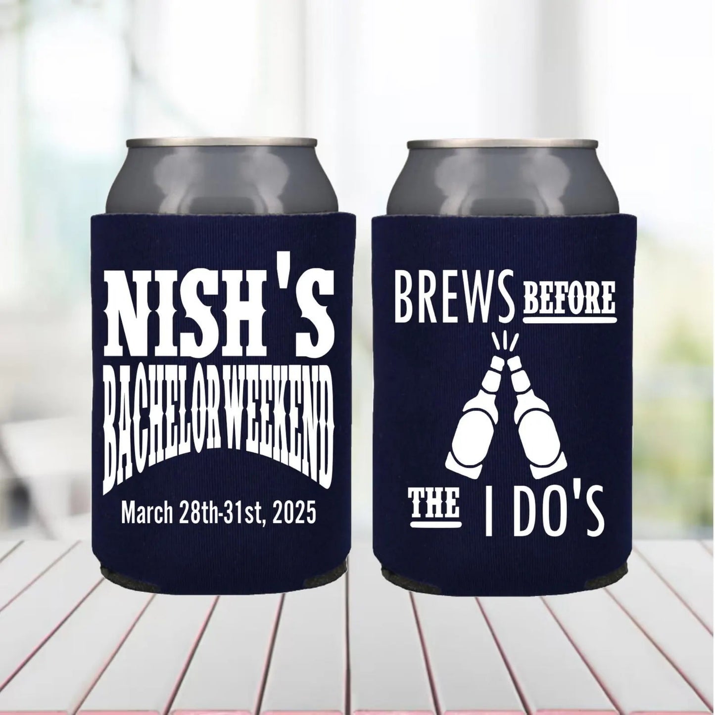 Two can coolers with personalized text on a wooden surface.