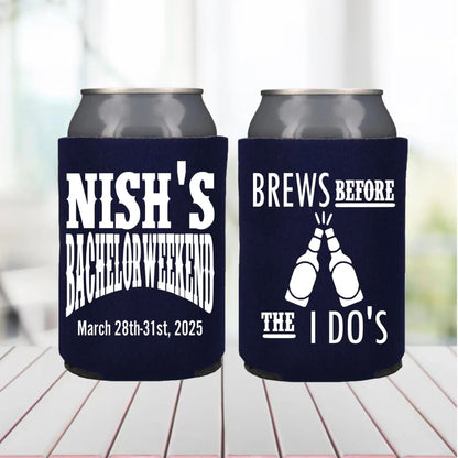 Two can coolers with personalized text on a wooden surface.