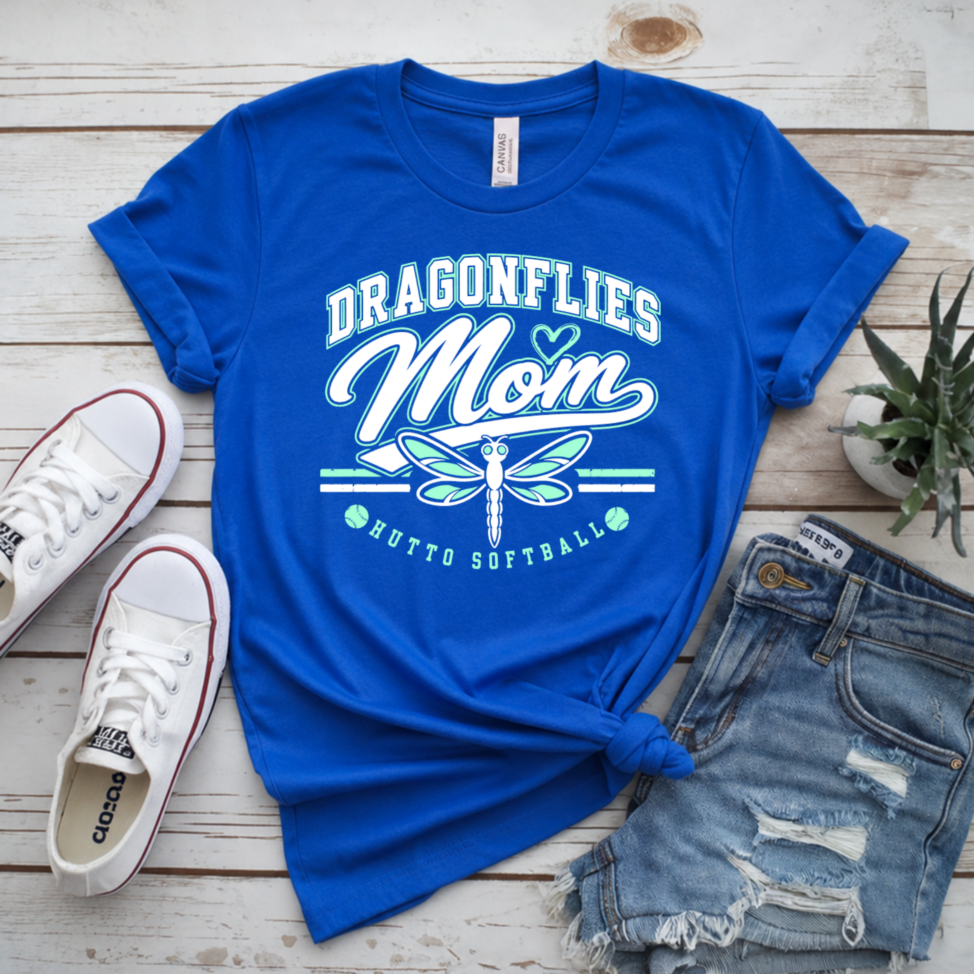 Royal blue Hutto Dragonflies Mom softball shirt with white mint dragonfly and Hutto Softball design