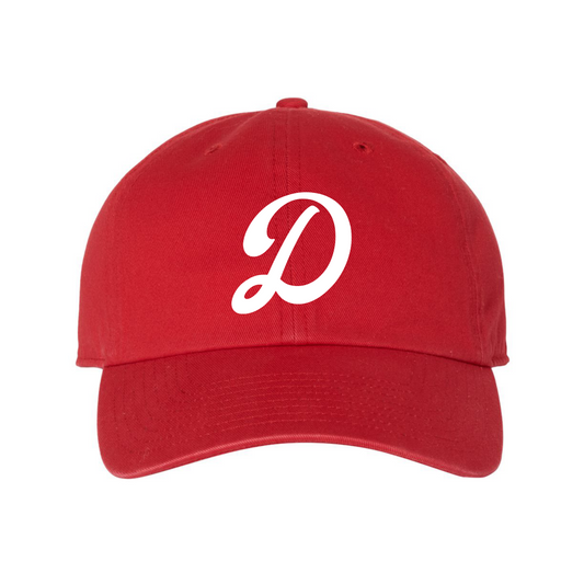 A red baseball cap with a curved brim, featuring a white cursive letter 'D' embroidered on the front, set against a plain white background.
