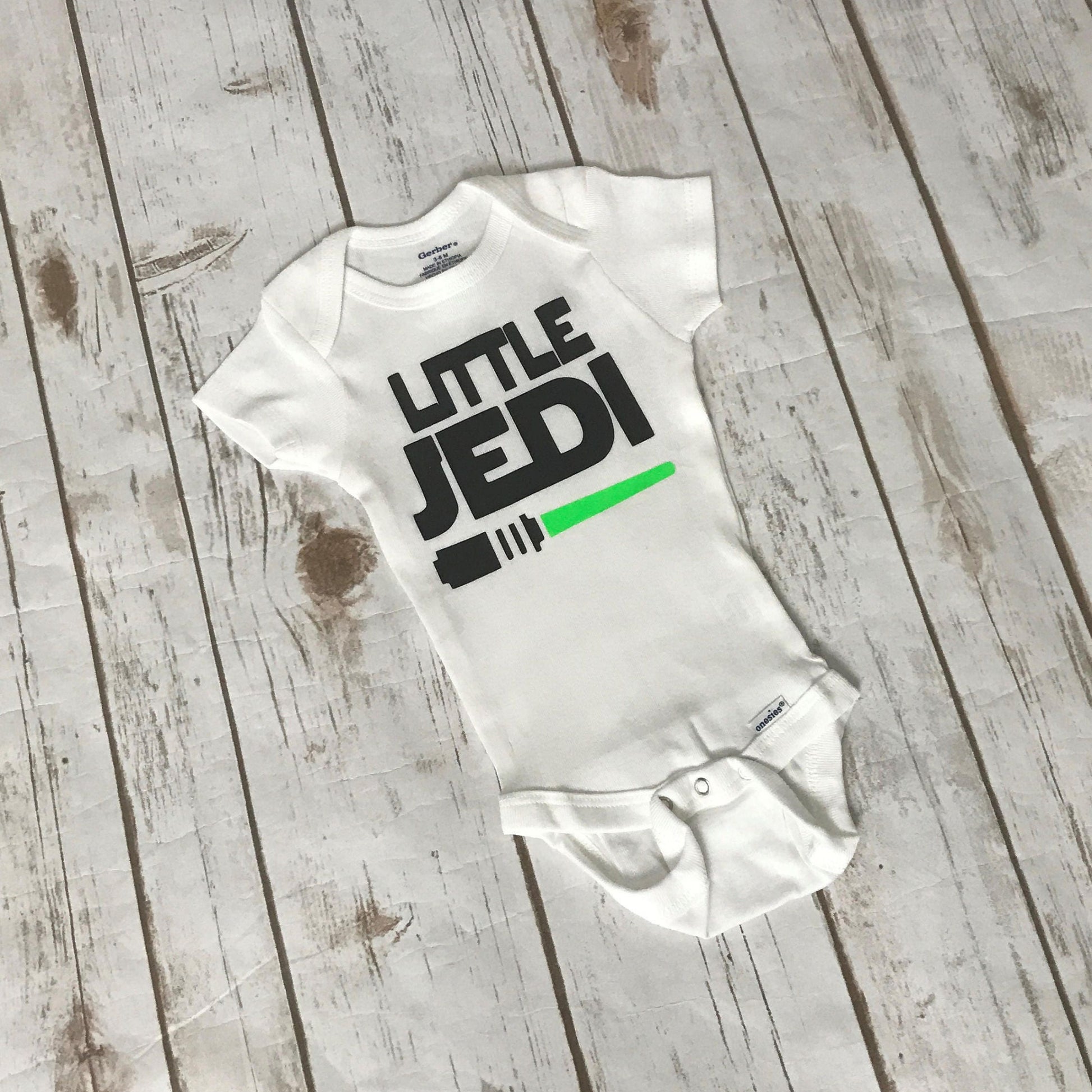 Green Light Saber on White Bodysuit