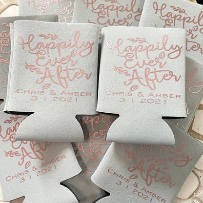 Koozies with 'Happily Ever After' text and personalized names and date on a neutral background.