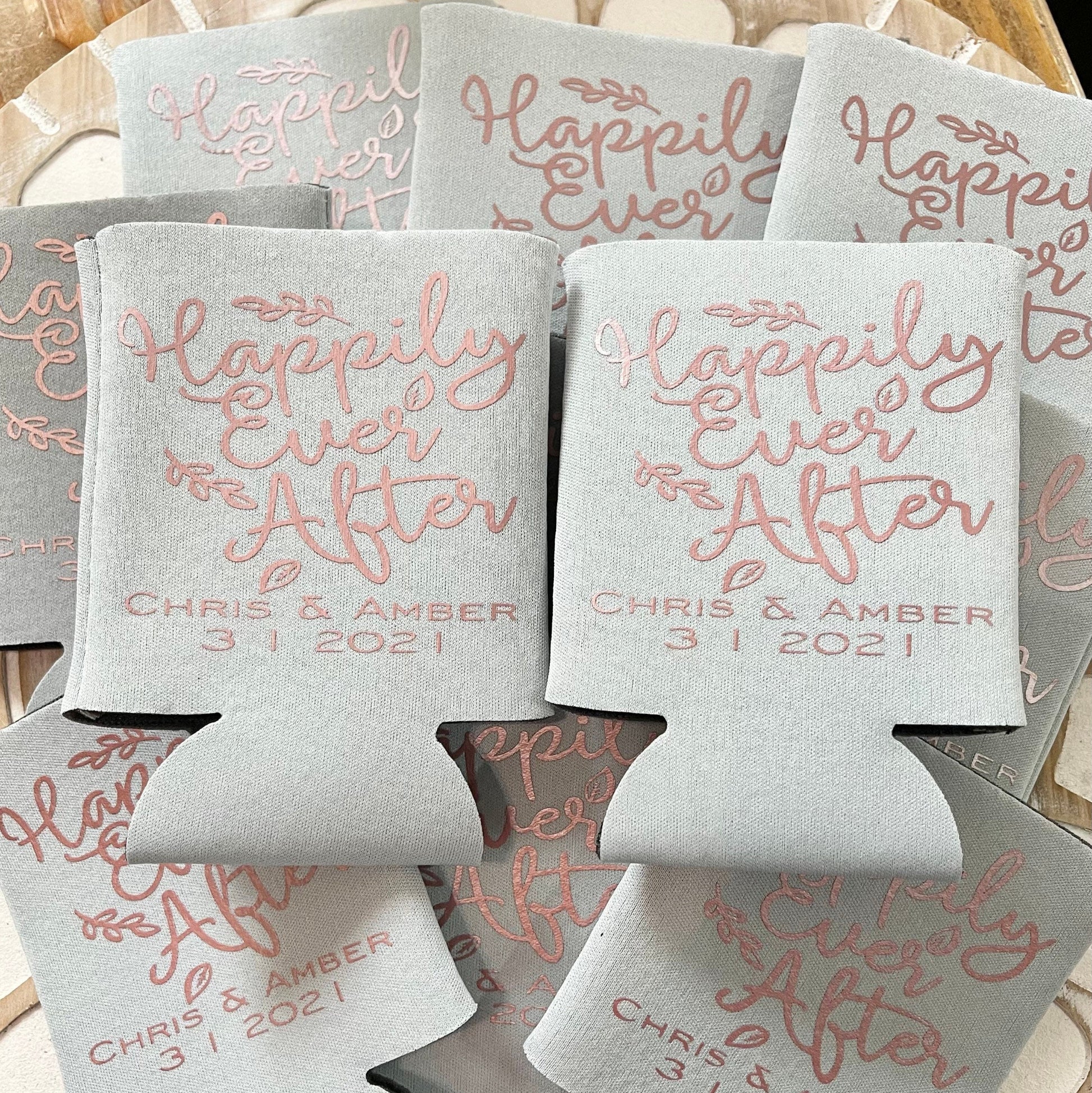 Gray can coolers with 'Happily Ever After' text and personalized names and date.