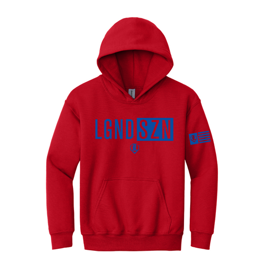 A red pullover hoodie with a blue graphic print reading 'LGNDSZN' across the chest and a small flag-style patch on the right sleeve, shown on a plain white background.